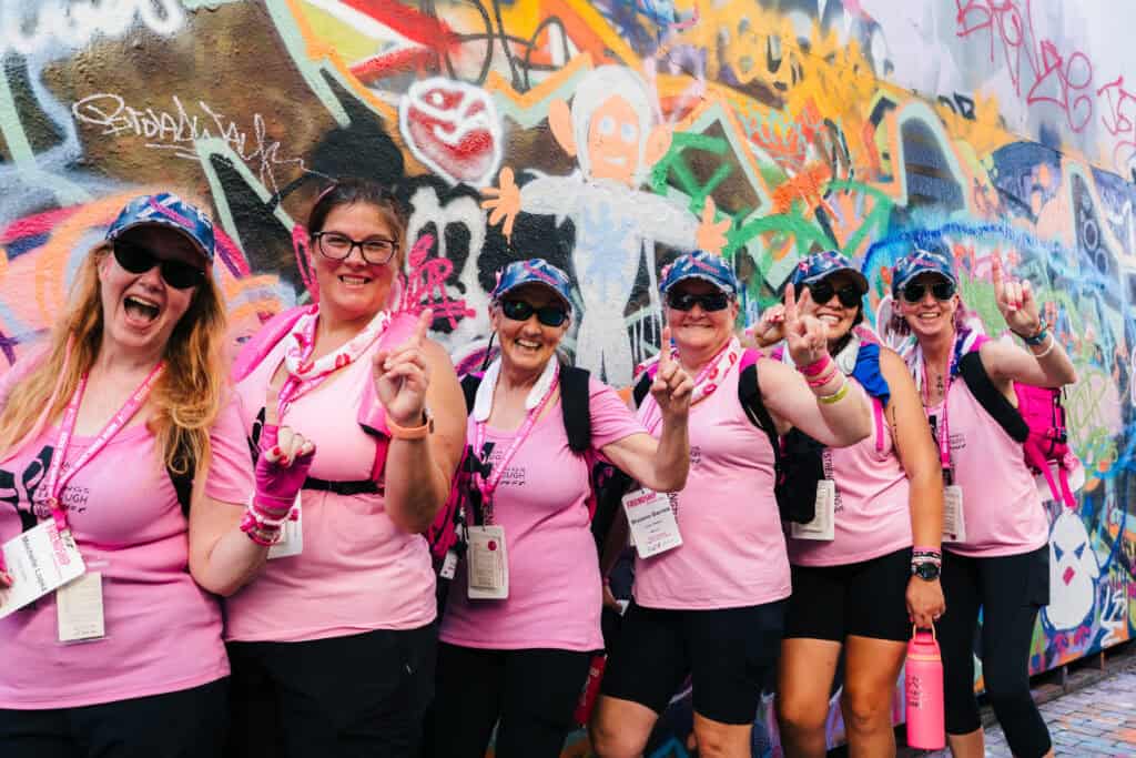 A group of 3-Day walkers at Graffiti Alley at the 2025 Susan G. Komen Boston 3-Day.