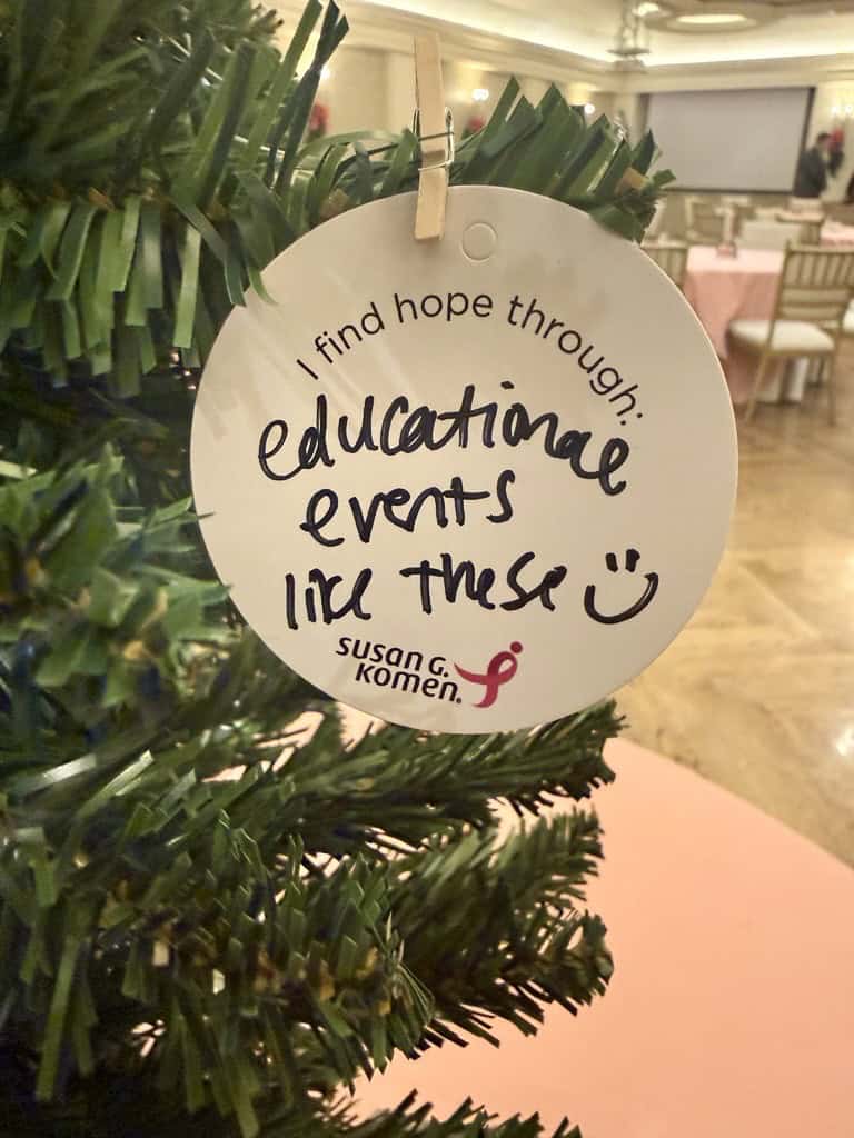 A Christmas tree ornament with the prompt, "I found hope through" and someone has written "educational events like these."