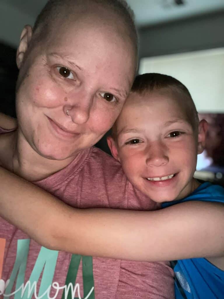 Breast cancer survivor Keisha and her son