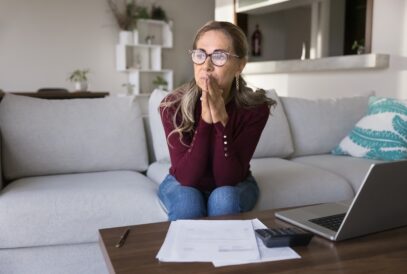 Woman pensive anxious on couch